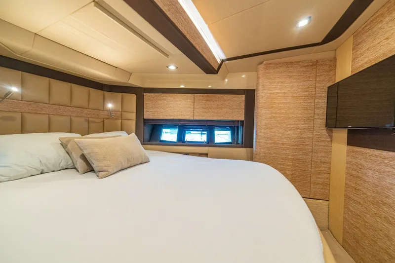 Costa Luna Yacht Photos Pics Luxurious interior of 2014 Azimut 64 yacht with elegant bedding and modern design.