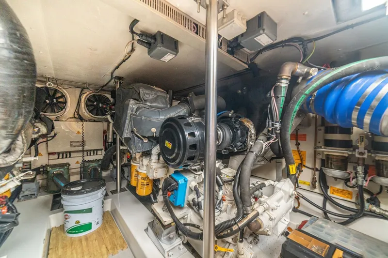 Costa Luna Yacht Photos Pics Engine room of a 2014 Azimut 64 yacht, showcasing machinery and components.
