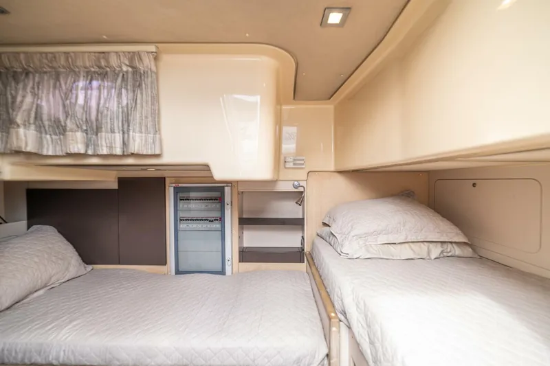 Costa Luna Yacht Photos Pics Interior cabin of 2014 Azimut 64 yacht with twin beds and modern design.