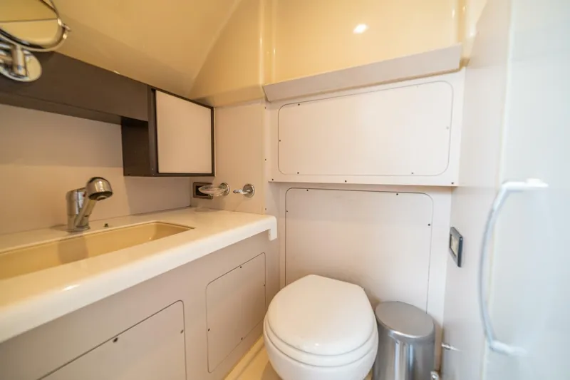 Costa Luna Yacht Photos Pics Luxurious bathroom in 2014 Azimut 64 yacht, featuring modern fixtures and sleek design.