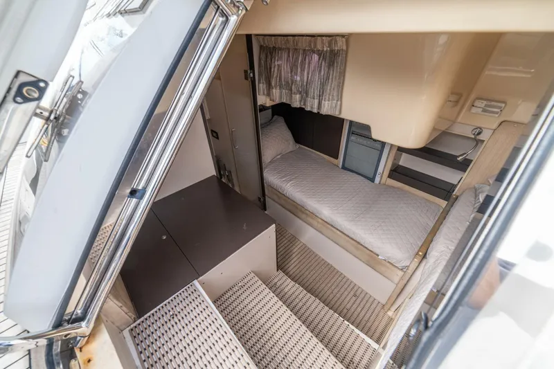 Costa Luna Yacht Photos Pics 2014 Azimut 64 yacht interior cabin with single bed and modern amenities.