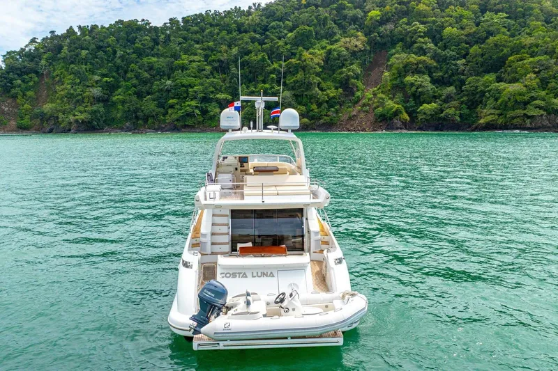 Costa Luna Yacht Photos Pics Azimut 64 yacht, 2014 model, anchored in scenic tropical waters.