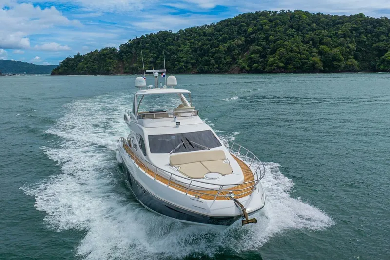 Costa Luna Yacht Photos Pics Luxurious 2014 Azimut 64 yacht cruising in scenic tropical waters.