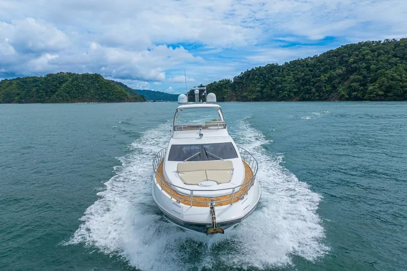 Costa Luna Yacht Photos Pics Luxurious 2014 Azimut 64 yacht cruising through scenic blue waters.