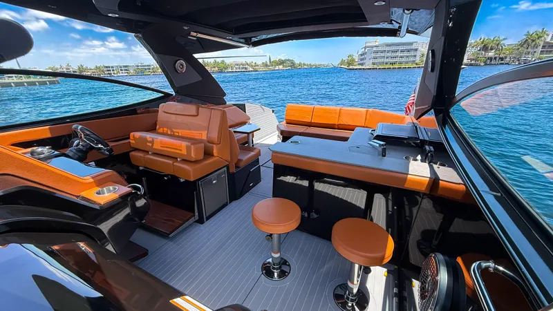 Black Diamond Yacht Photos Pics 2022 Cruisers Yachts 38 GLS interior with luxurious seating and scenic water view.