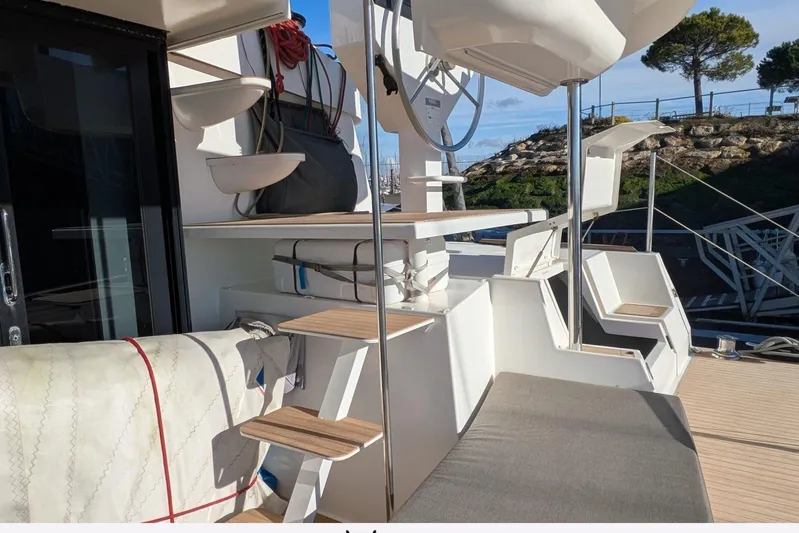  Yacht Photos Pics Deck view of 2018 NEEL 51 trimaran with seating and helm station.