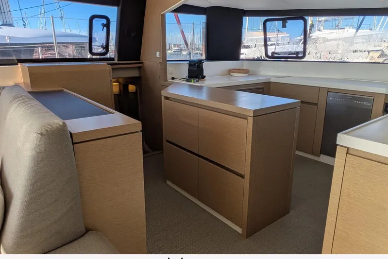  Yacht Photos Pics Modern kitchen interior on 2018 NEEL 51 yacht with sleek cabinetry and large windows.