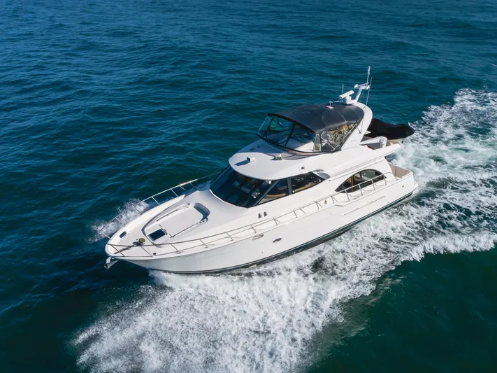 Jolie Vie Yacht Photos Pics 2004 Meridian 540 Pilothouse yacht cruising on open blue waters.