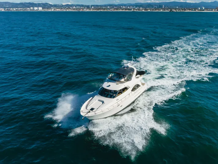 Jolie Vie Yacht Photos Pics 2004 Meridian 540 Pilothouse yacht cruising on open blue water.