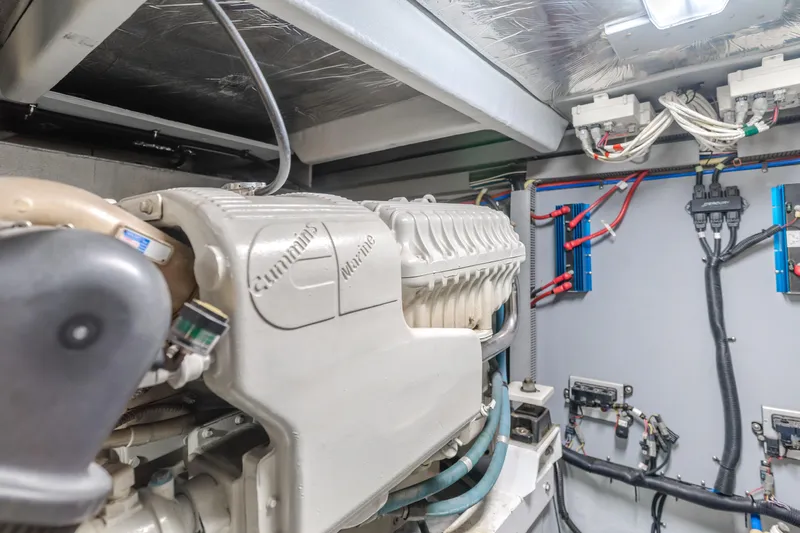 Jolie Vie Yacht Photos Pics Engine room of 2004 Meridian 540 Pilothouse with Cummins marine engine and wiring.