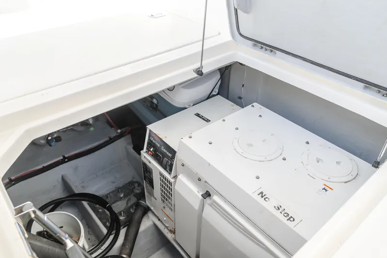 Jolie Vie Yacht Photos Pics Engine compartment of 2004 Meridian 540 Pilothouse with mechanical equipment.