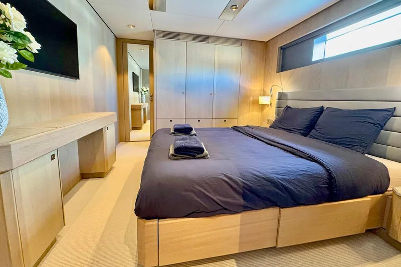  Yacht Photos Pics Luxurious bedroom interior of 2026 Outer Reef Yachts 780 Adventure, featuring modern design and cozy ambiance.