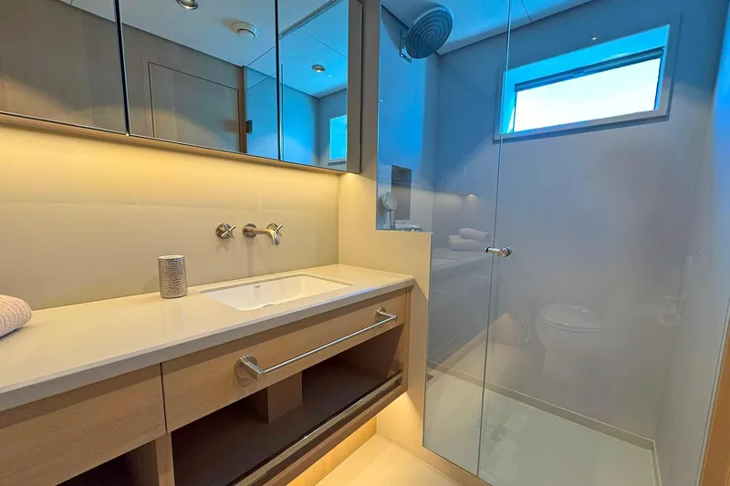  Yacht Photos Pics Luxurious bathroom in 2026 Outer Reef Yachts 780 Adventure, featuring modern fixtures and glass shower.