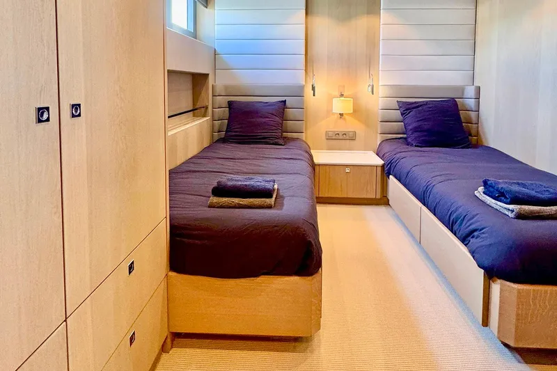  Yacht Photos Pics Luxurious twin cabin interior of 2026 Outer Reef Yachts 780 Adventure, featuring modern design.