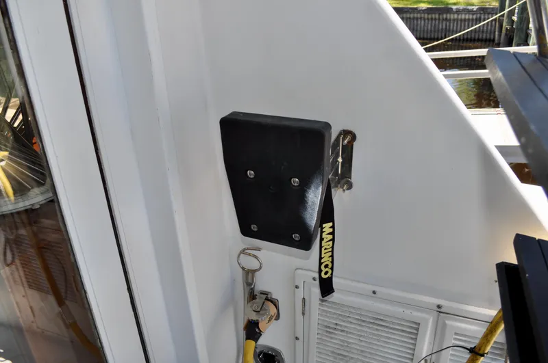 Freakin' Awesome Yacht Photos Pics 1990 Ocean Alexander 42 Sedan boat detail with keys and equipment on deck.