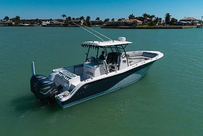 Yacht Photos Pics 2018 Sea Fox 328 Commander boat on calm water, featuring Yamaha engines.