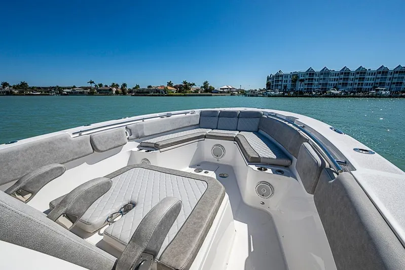  Yacht Photos Pics 2018 Sea Fox 328 Commander boat interior with spacious seating and scenic waterfront view.
