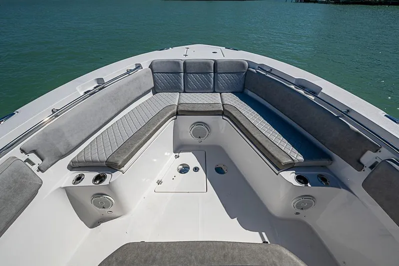  Yacht Photos Pics 2018 Sea Fox 328 Commander boat interior with cushioned seating and ocean view.