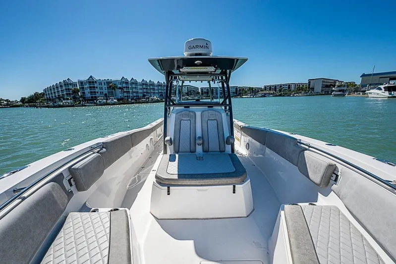  Yacht Photos Pics 2018 Sea Fox 328 Commander boat on water, with modern seating and Garmin equipment.