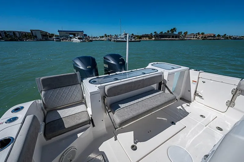  Yacht Photos Pics 2018 Sea Fox 328 Commander boat interior with seating and dual Yamaha engines.