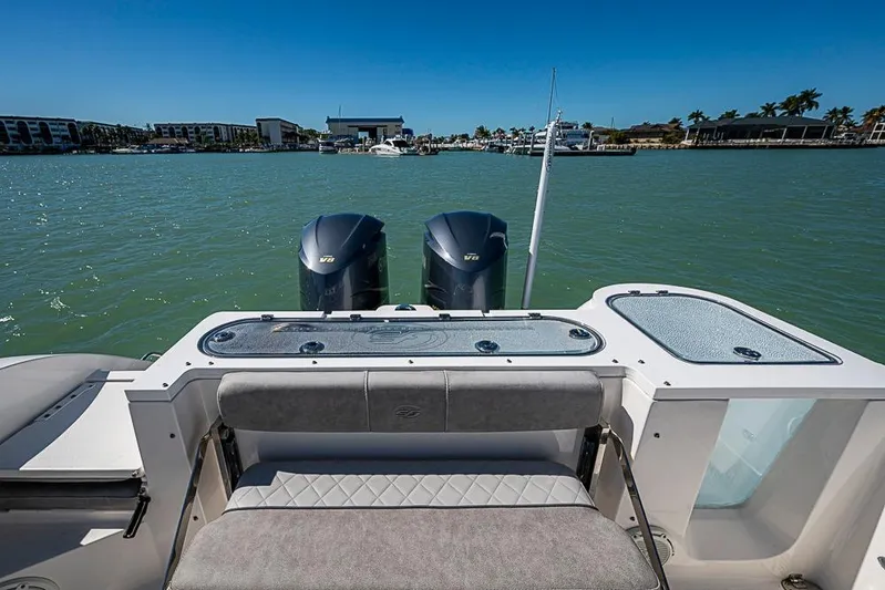  Yacht Photos Pics 2018 Sea Fox 328 Commander boat with dual engines on calm water.