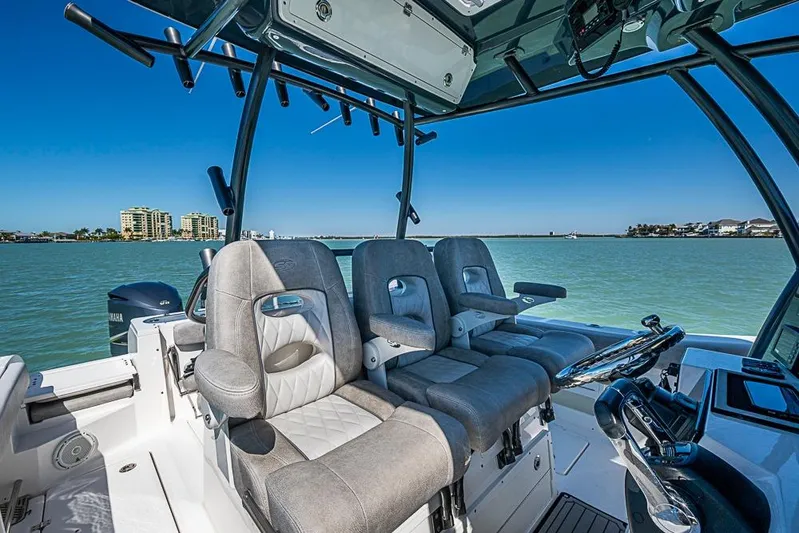  Yacht Photos Pics 2018 Sea Fox 328 Commander boat interior with plush seating and scenic water view.
