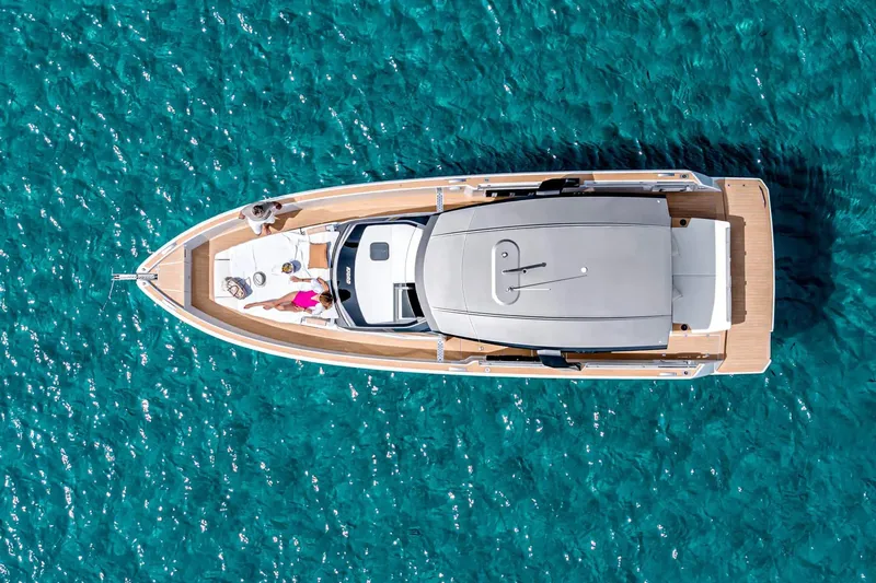  Yacht Photos Pics Aerial view of 2025 Hanse Fjord 39 XL yacht on clear blue water.