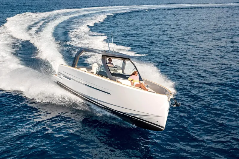  Yacht Photos Pics 2025 Hanse Fjord 39 XL yacht cruising swiftly on open blue waters.