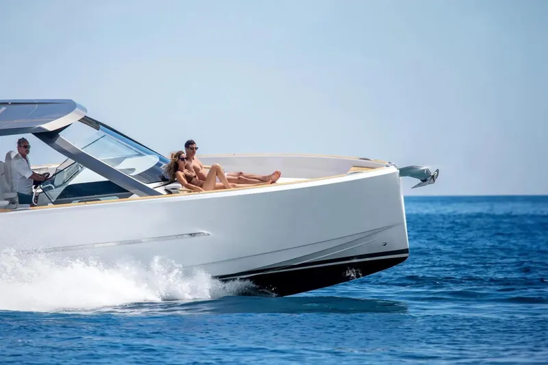  Yacht Photos Pics 2025 Hanse Fjord 39 XL yacht cruising with passengers on a sunny day.