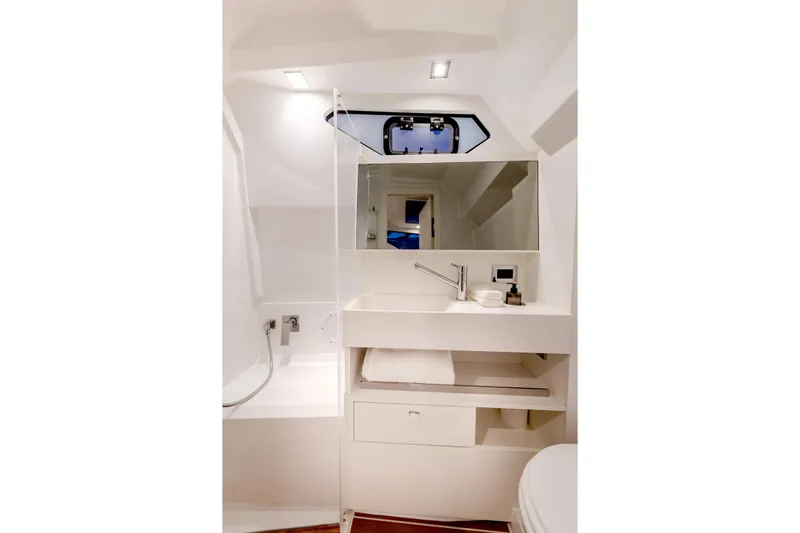  Yacht Photos Pics Luxurious bathroom interior of 2025 Hanse Fjord 39 XL yacht, featuring modern fixtures and sleek design.