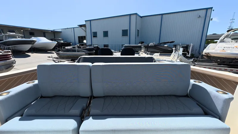 Trasea Yacht Photos Pics Saxdor SX 320 GTO 2025 with blue seating at marina.