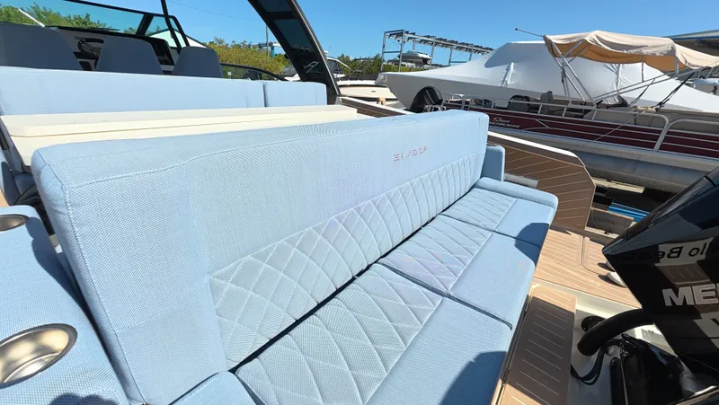 Trasea Yacht Photos Pics Saxdor SX 320 GTO 2025 with blue upholstered outdoor seating.