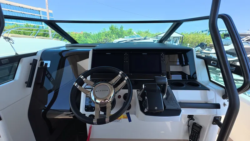 Trasea Yacht Photos Pics Cockpit of 2025 Saxdor SX 320 GTO with modern steering and instruments.