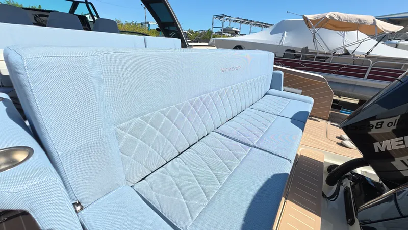 Trasea Yacht Photos Pics Saxdor SX 320 GTO 2025 with blue upholstery outdoors.