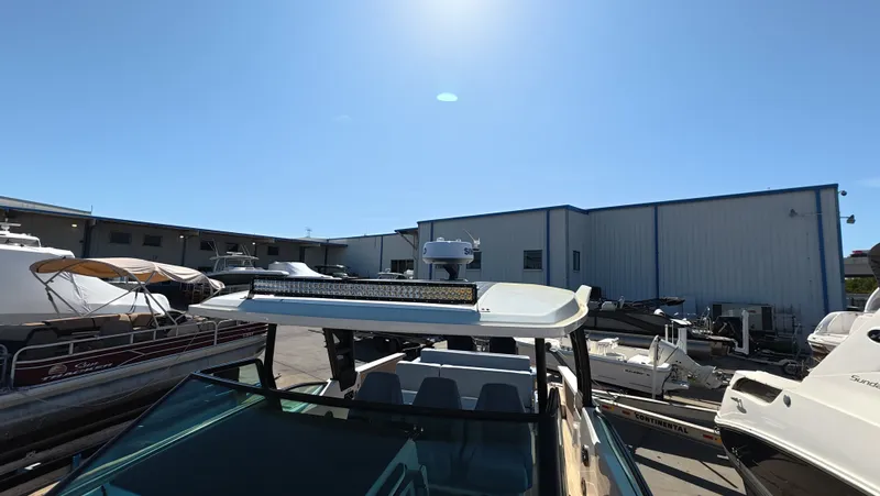 Trasea Yacht Photos Pics Saxdor SX 320 GTO 2025 in a marina under sunny skies.