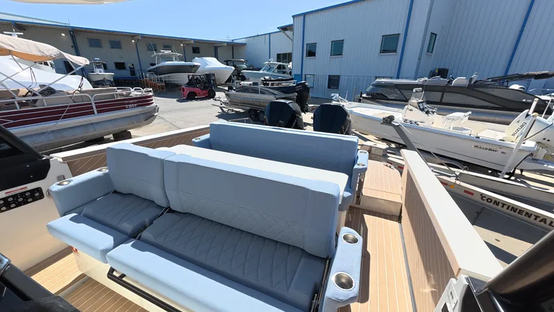 Trasea Yacht Photos Pics Saxdor SX 320 GTO 2025 at marina with luxurious interior seating.