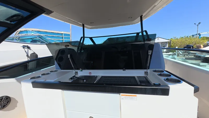Trasea Yacht Photos Pics Saxdor SX 320 GTO 2025 with modern helm console and cup holders.