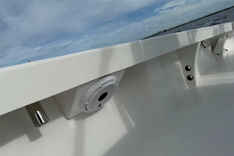  Yacht Photos Pics 2023 T Craft 27 boat interior with speaker and ocean view.