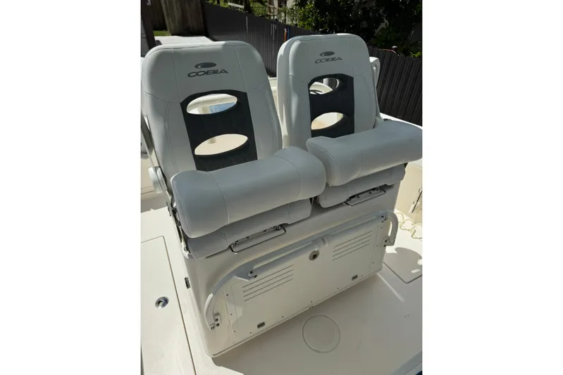  Yacht Photos Pics 2024 Cobia 280 Center Console boat seats, featuring sleek design and comfortable cushioning.