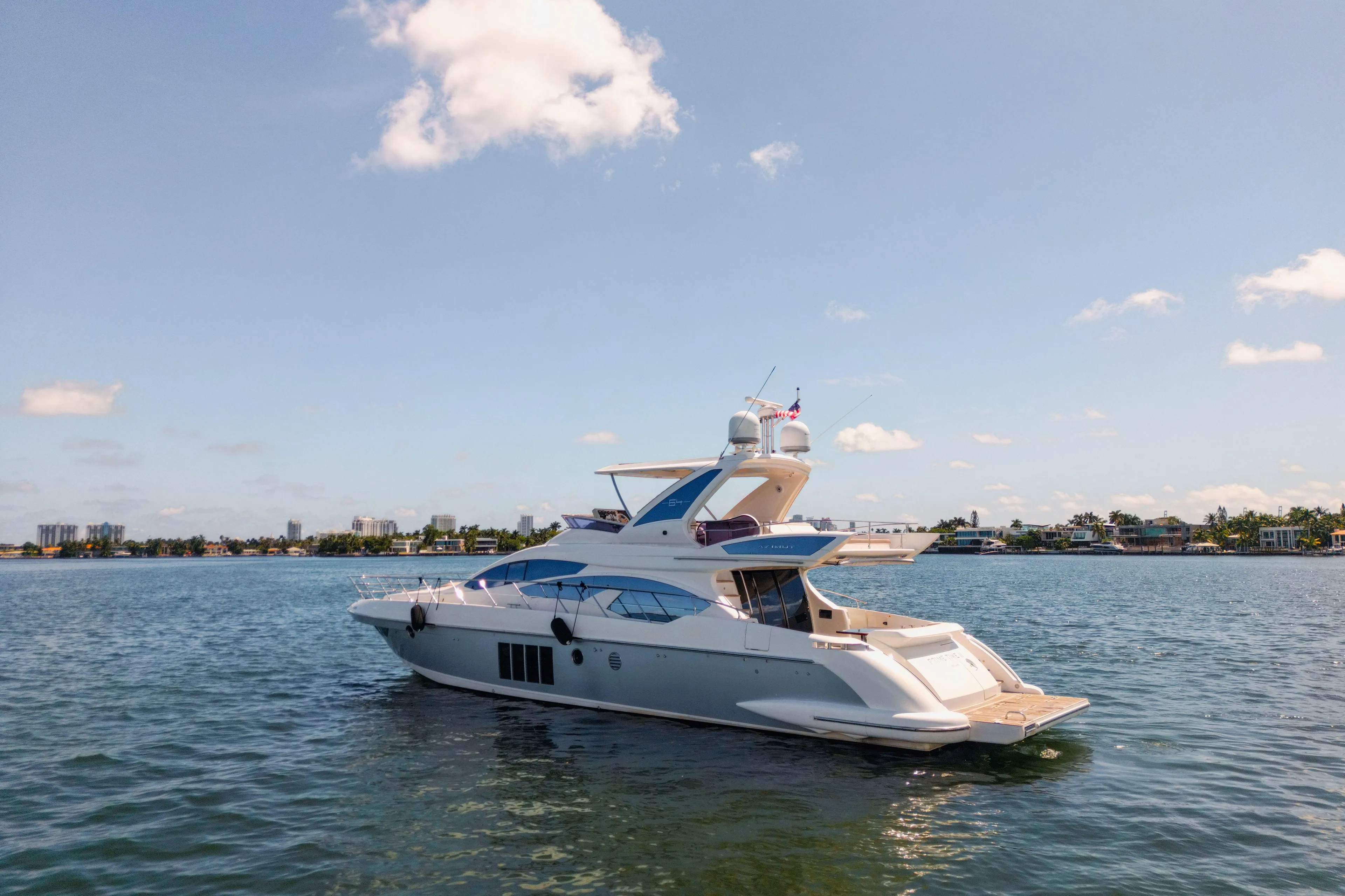 Prime Time II Yacht Photos Pics 2016 Azimut 64 Flybridge yacht cruising on a sunny day.