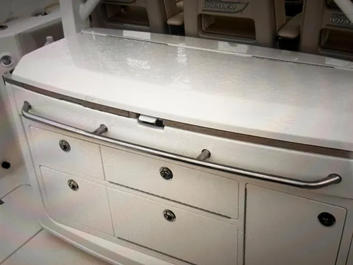  Yacht Photos Pics Boston Whaler 380 Outrage 2020 model boat storage and seating area.