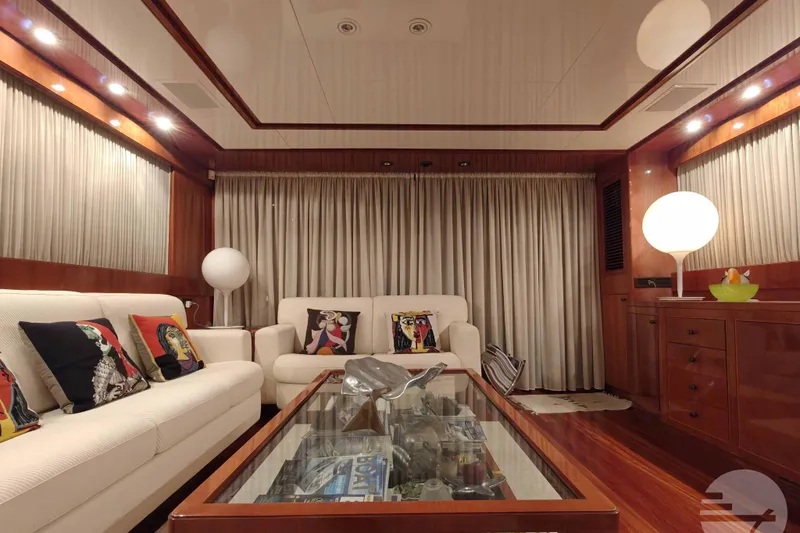  Yacht Photos Pics Luxurious interior of 1999 Sanlorenzo SL82 yacht with elegant seating and modern decor.