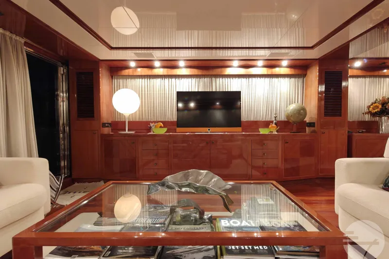  Yacht Photos Pics Luxurious interior of 1999 Sanlorenzo SL82 yacht with elegant wood paneling and modern decor.