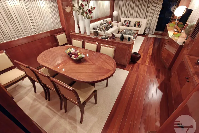  Yacht Photos Pics Luxurious interior of 1999 Sanlorenzo SL82 yacht with elegant dining and living area.