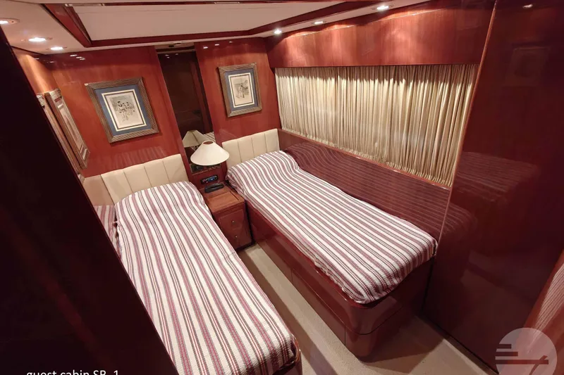  Yacht Photos Pics Luxurious guest cabin with twin beds on 1999 Sanlorenzo SL82 yacht.