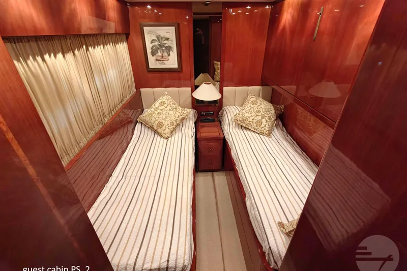  Yacht Photos Pics Luxurious guest cabin with twin beds on 1999 Sanlorenzo SL82 yacht.