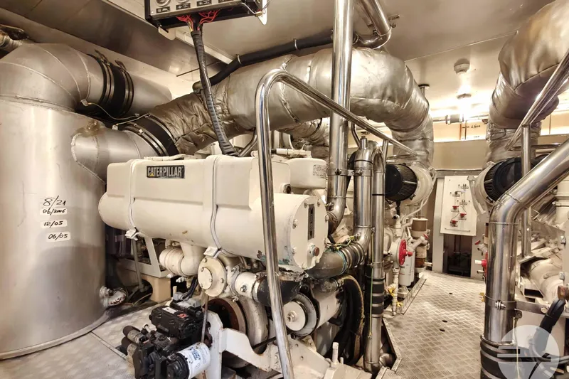  Yacht Photos Pics Engine room of 1999 Sanlorenzo SL82 yacht with Caterpillar machinery.