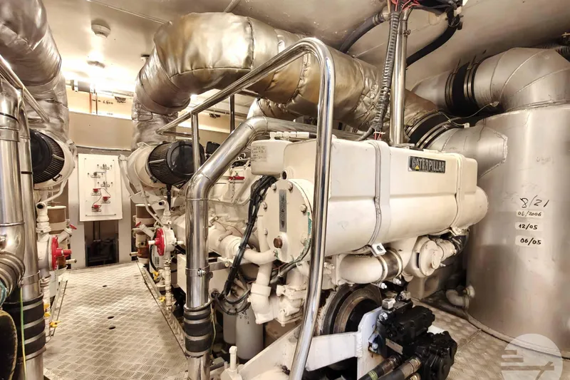  Yacht Photos Pics Engine room of 1999 Sanlorenzo SL82 yacht with Caterpillar machinery.
