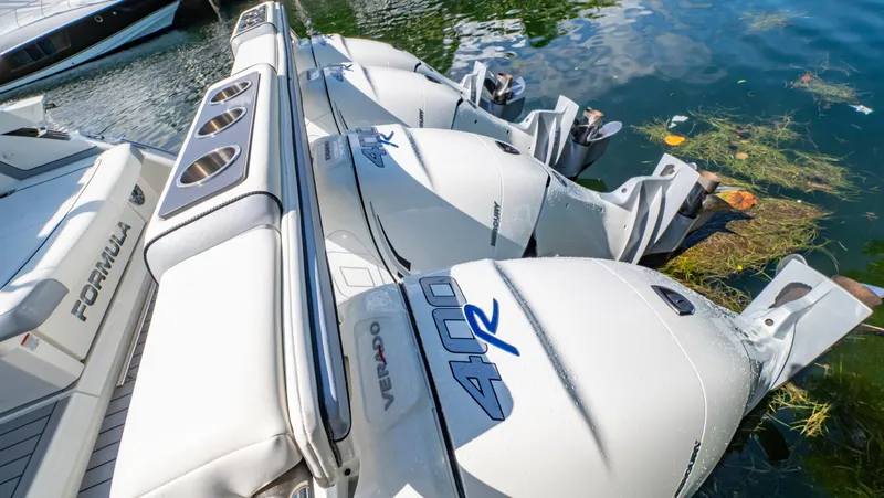  Yacht Photos Pics 2021 Formula 430 Super Sport Crossover with powerful outboard engines on water.