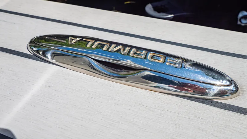  Yacht Photos Pics Chrome "Formula" emblem on 2021 Formula 430 Super Sport Crossover boat.